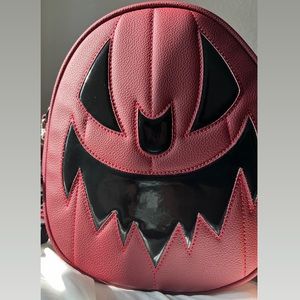 New oval pumpkin wine and black vinyl love pain and stitches bag